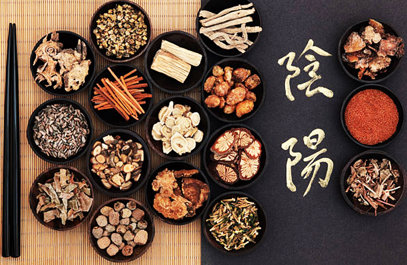 Chinese herbal medicine with yin and yang caligraphy script.