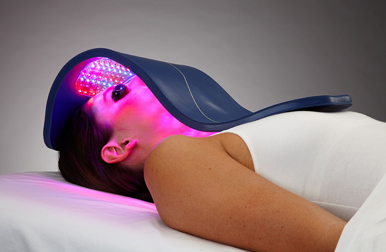 woman receiving celluma light therapy treatment